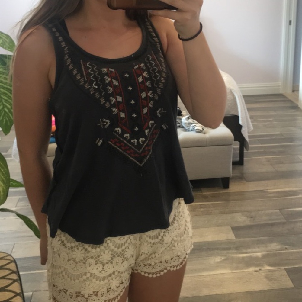 Really cute top with a boho design
